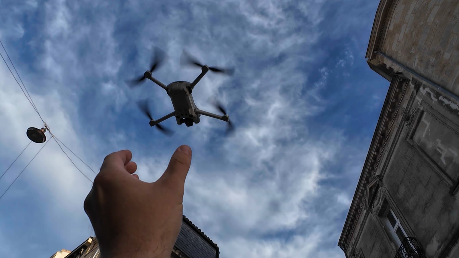 Launching the drone from an outstretched hand